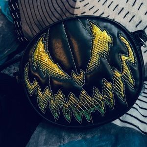 love pain and stitches crossbody bag